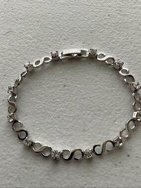 Silver Tone Infinity Link Bracelet with Clear Stones